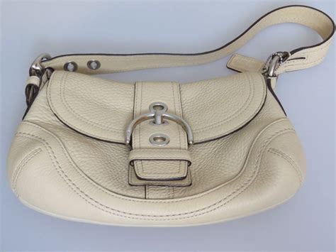 coach 0879-f10909 black and whitereal or fake